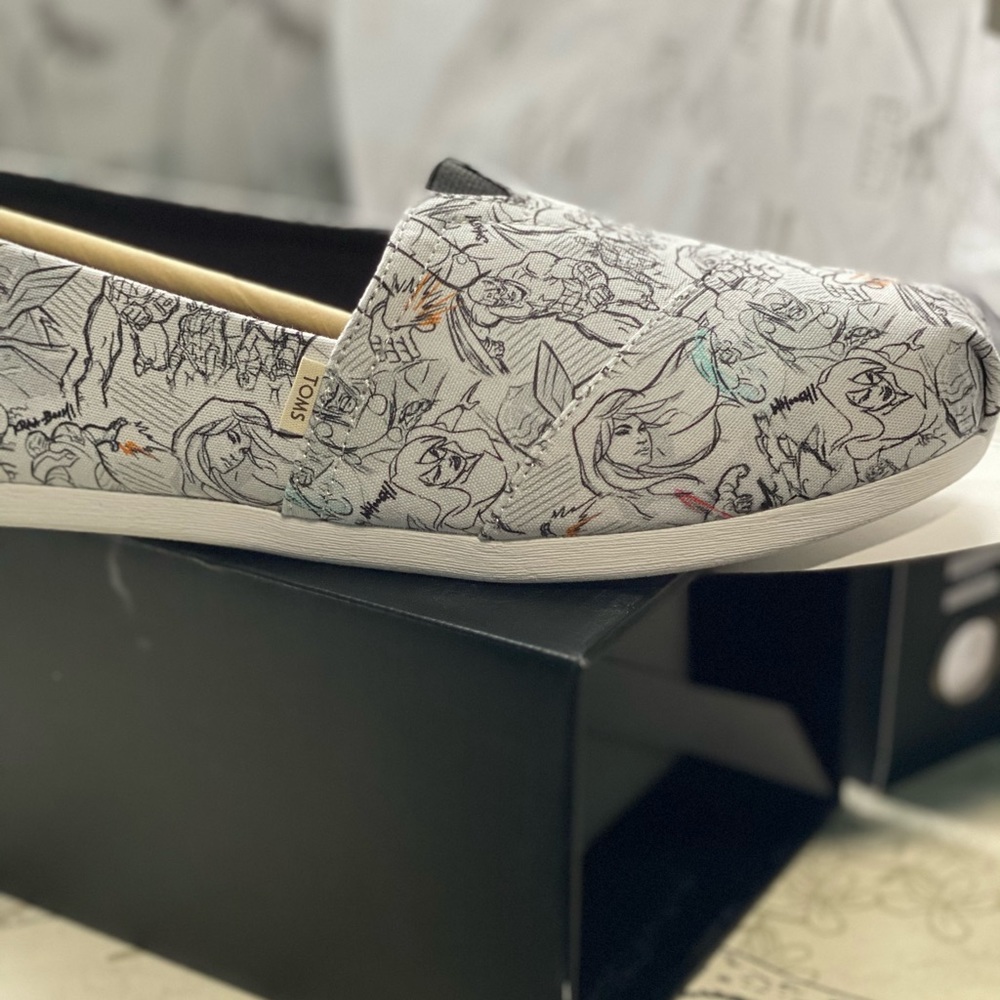 Tom’s marvel shoes. Never worn. Too small for me
